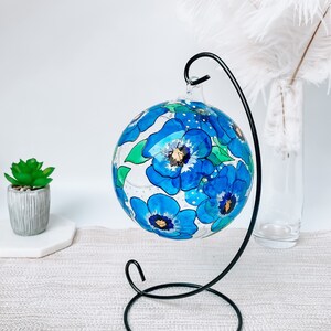 Hand Painted hanging glass candle holder with metal stand, with blue pansies and green leaves. Great choice as a unique gift for Mothers Day, Christmas Gift, Unique Birthday Gift, this glass tealight holder will truly impress the receiver.