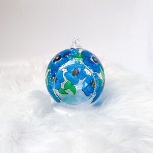 Hand Painted hanging glass candle holder with metal stand, with blue pansies and green leaves. Great choice as a unique gift for Mothers Day, Christmas Gift, Unique Birthday Gift, this glass tealight holder will truly impress the receiver.