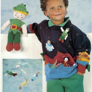 May include: A child wearing a blue, red, and green knitted sweater with a pocket and several knitted characters attached. The sweater has the text "Thingumy-Knit!" on the background.