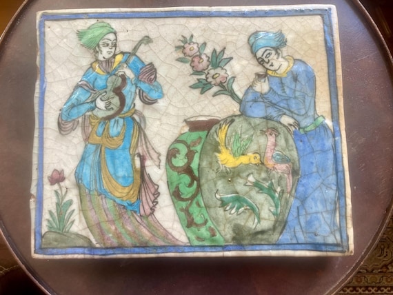 Antique Persian Qajar Moulded Figural Tile – Musician, Birds & Garden Scene – c.1880–1910