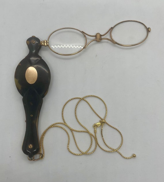 Gold (9kt) Lorgnette with tortoise shell case