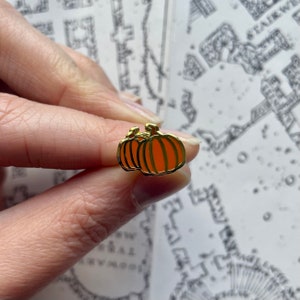 Mini pumpkins enamel pin