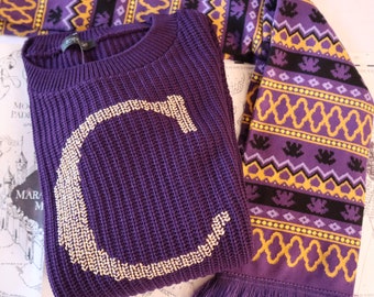 Purple 21/26 jumper with gold C stitched on it already