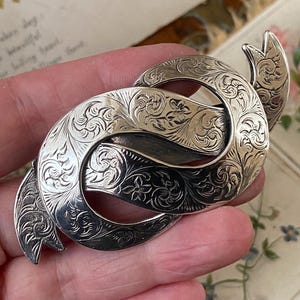 Antique Victorian / Edwardian engraved sterling silver ribbon twist brooch / pin. ( 2 )