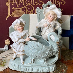 Beautiful antique romantic Victorian German bisque boy & girl with swan sleigh flower posy vase 2 pce table centre decoration ornament (UC)