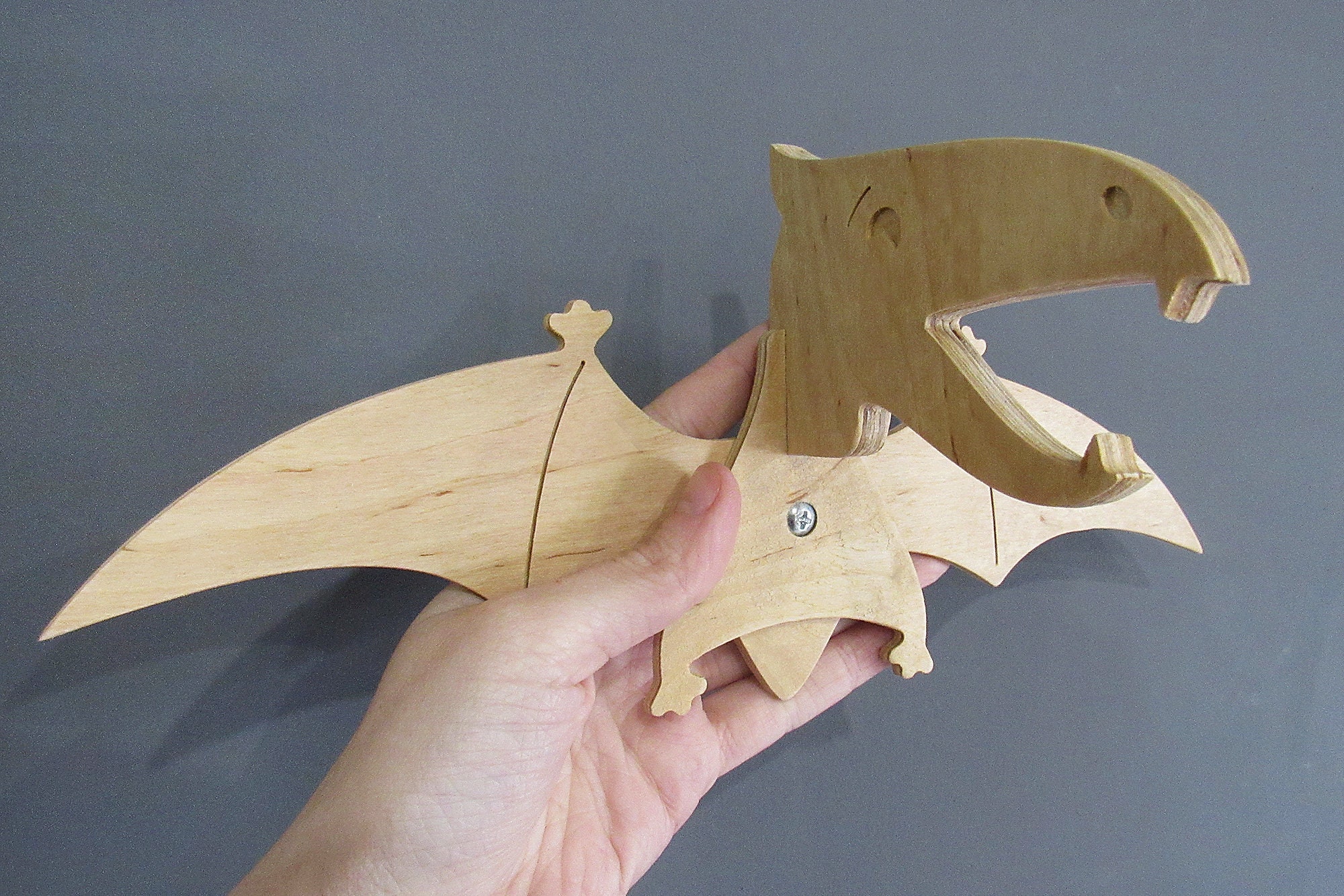 dinosaur with hook head