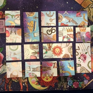 Grid layout of Magic Friend cards showing symbolic illustrations such as hearts, stars, keys, and animals.