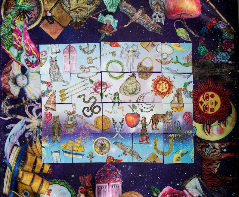 A complete set of Magic Friend patience game cards laid out on a deep space-themed cloth, printed with divination symbols.