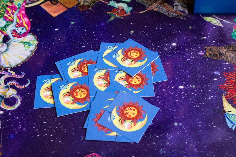 Stack of illustrated cards from the Magic Friend deck shown face down on a cosmic background.