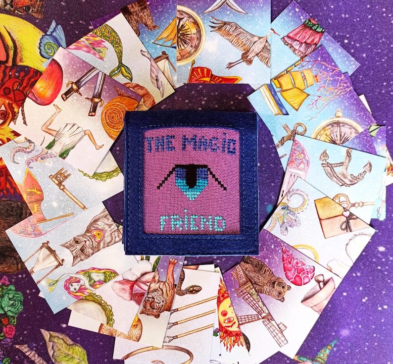 Magic Friend fortune-telling patience cards arranged in a circle with the handmade pouch in the center.