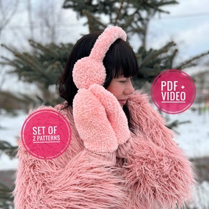 May include: Pink crocheted ear warmers and matching mittens. The ear warmers have a fluffy texture and are shaped like bunny ears. The mittens are also fluffy and have a simple design. The image includes the text "Set of 2 Patterns" and "PDF + Video".