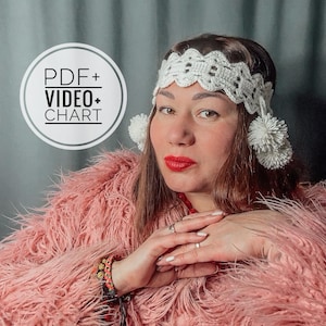 May include: A woman wearing a white crocheted headband with pom-poms and a pink faux fur coat. The image includes a circular graphic with the text "PDF+ VIDEO+ CHART". The woman has red lipstick and multiple rings.