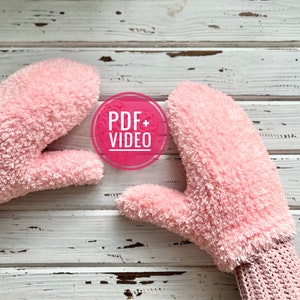 May include: Two pink fuzzy mittens with a white background. The text "PDF + VIDEO" is in a pink circle.