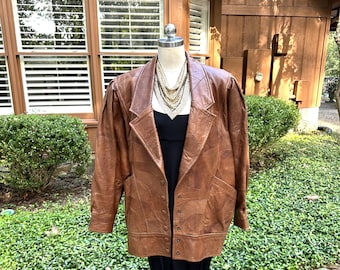 LINDA JAQUETA DE COURO COM PATCHWORK DOS ANOS 80/JAQUETA DE PATHWORK/JAQUETA DE COURO ASAS DE MORCEGO/JAQUETA DOS ANOS 80/JAQUETA DE COURO VINTAGE/JAQUETA BOMBER/EM PERFEITO ESTADO