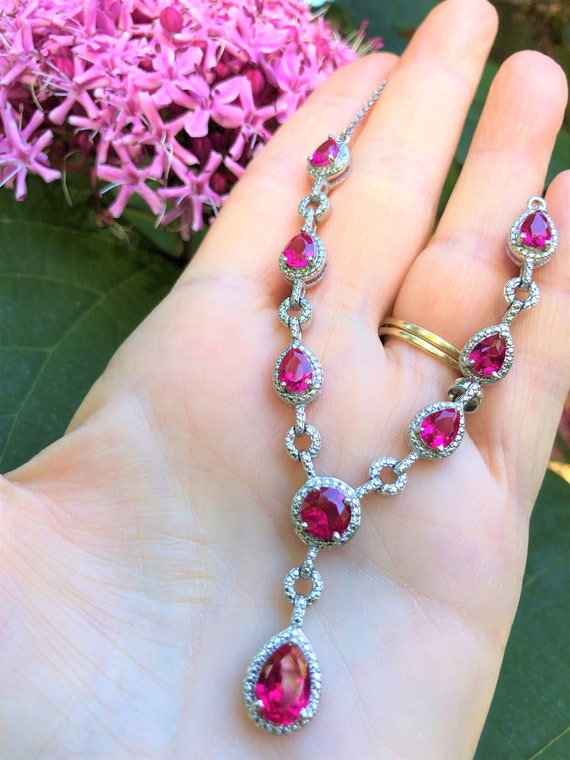 Pink glass hotsell necklace