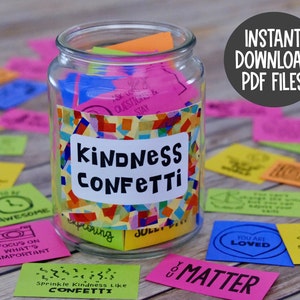 May include: A glass jar filled with colorful sticky notes with positive messages. The jar is labeled "Kindness Confetti". The notes are on a wooden surface with other notes scattered around the jar. The text "Instant Download PDF Files" is in a circle above the jar.