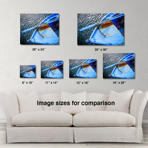 May include: A comparison of different sizes for a blue wooden boat with a rope attached to it. The boat is on a blue and white water background. The image shows the sizes 8x10 inches, 11x14 inches, 12x18 inches, 16x20 inches, 20x24 inches, and 20x30 inches.