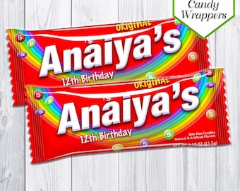 May include: Two red and white Skittles candy wrappers with a rainbow design. The wrappers say "Anaiya's 12th Birthday" and "Original".