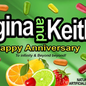 May include: A green and black package of sweets with the text "Regina & Keith Happy Anniversary To infinity & Beyond beyond!" and a variety of fruit-flavoured sweets. The sweets are labelled as cherry, lemon, strawberry, lime, and orange.
