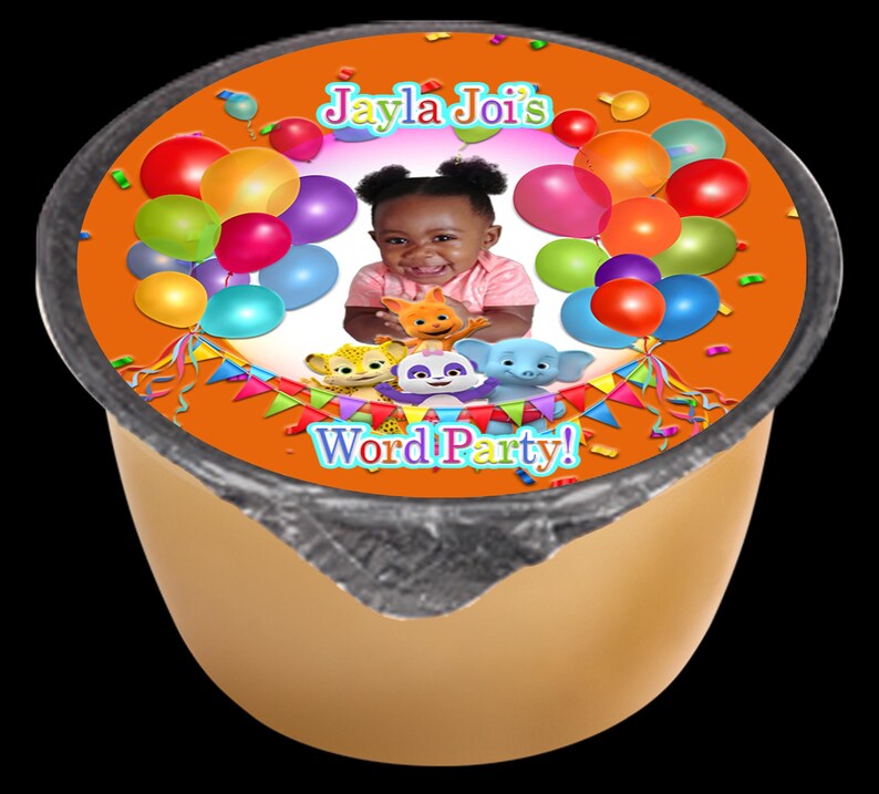 May include: Orange and yellow container with a colorful label featuring a child's photo, balloons, and the text "Jayla Joi's Word Party!"
