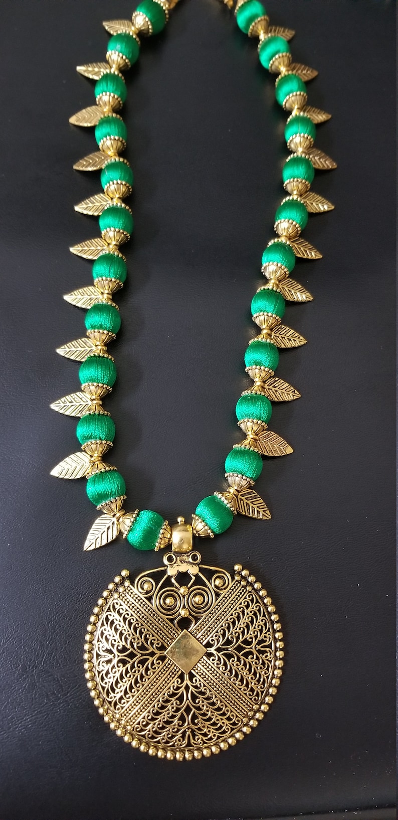 Indian Fashion Jewelry MK Fashionkart Antique finish pendent with green silk thread beads and Antique leaves