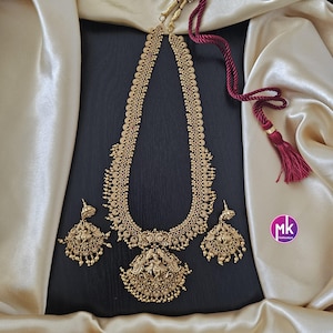 Stunning Krishna Premium quality Gold Jewelry Replica Haram with big pendent with matching Big Earrings - Bridal Haram - MK Fashionkart