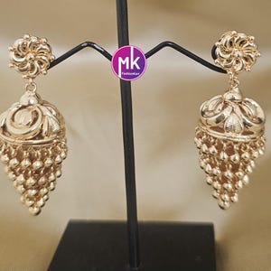 Beautiful Gold finish Multi-layer big Jhumka with hanging gold beads - Gold Jewelry Inspired Jhumka - MK Fashionkart - Fashion Jewelry