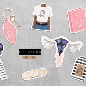 May include: A set of stickers featuring various designs, including a woman wearing a "Girl Boss" shirt, a book with the text "You Go Girl", a heart with a galaxy design, a uterus with a galaxy design, a band-aid with the text "You Go Girl", and a tag with the text "Girl Boss".