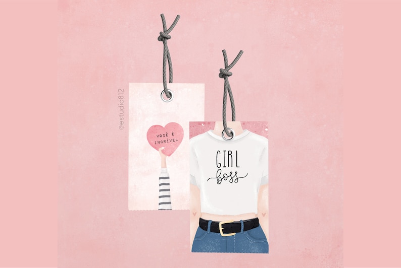 May include: Two gift tags with string attached. The tag on the left has a pink heart with the text "voce e incrivel" in black. The tag on the right has a white t-shirt with the text "GIRL boss" in black.