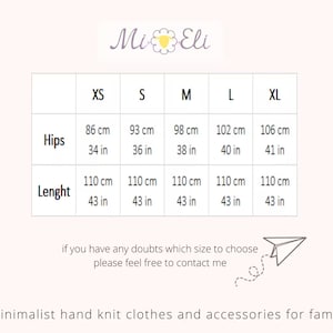 May include: Size chart for knit clothing with measurements in inches and centimeters. The chart shows sizes XS, S, M, L, and XL with measurements for hips and length.