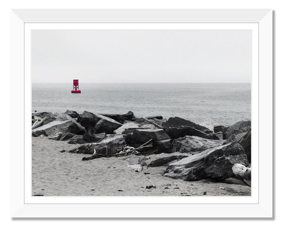Red Buoy With Harbor Jetty Rocks And Ocean Black White