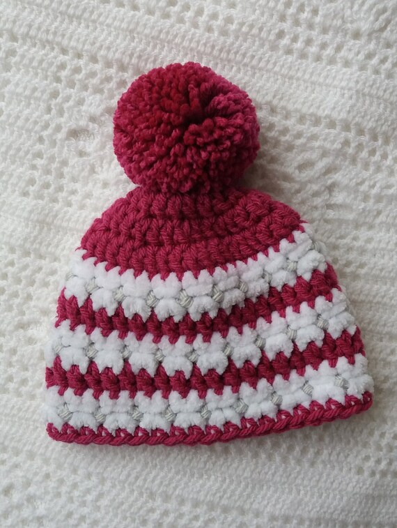 pink bobble hat baby
