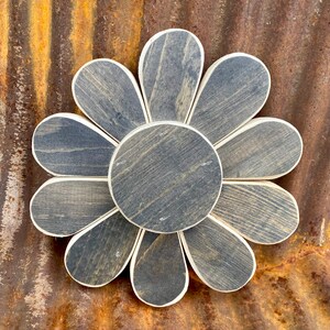 Miniature black wooden flower home wall art crafted from upcycled salvaged pine