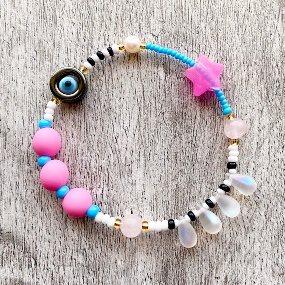 Sensory Fidget Bracelet. Sliding Glow in the Dark Pink Star, Hematite Evil  Eye Spinner, Rubber, Glass, Freshwater Pearl, Rose Quartz Beads. 