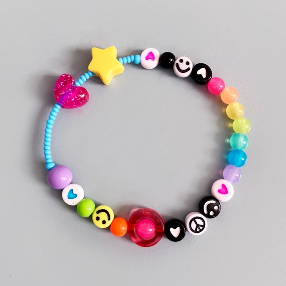 Beaded fidget sensory bracelet for anxiety relief/ADHD Autism. Rainbow  colours with hearts, stars, smileys.