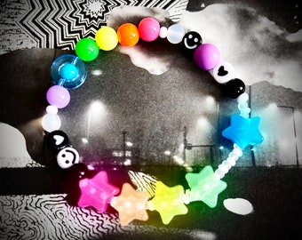 Sensory Fidget Bracelet. Sliding Glow in the Dark Pink Star