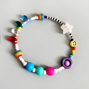 Sensory fidget bracelet. Rainbow, sliding glow in the dark star, hematite smiley spinner, rubber and glass beads. Adult or child size. image 3