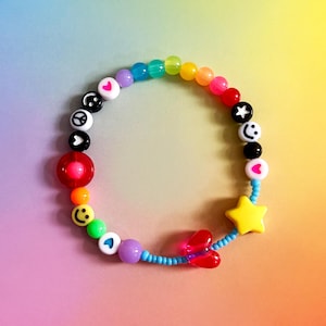 Beaded fidget sensory bracelet for anxiety relief/ADHD Autism. Rainbow colours with hearts, stars, smileys.