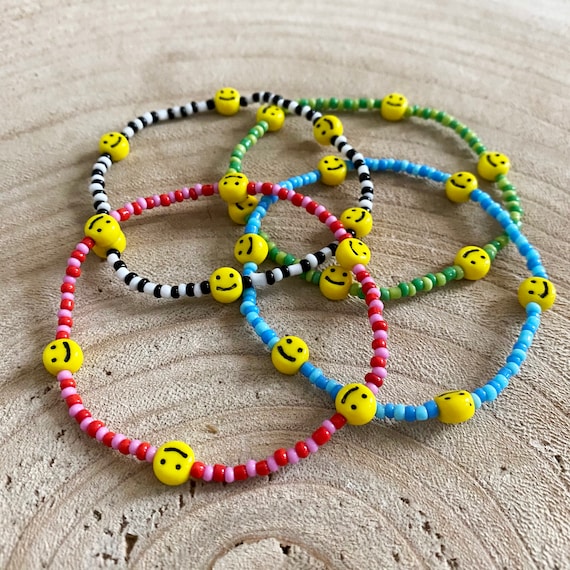 Handmade Smiley beaded bracelet. Czech glass beads. Blue Green Black white red pink. One bracelet supplied