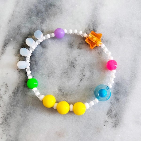 Sensory fidget bracelet. Sliding star, spinner, silicone, glass and acrylic beads. Pink, yellow, orange, green, blue, purple. Adult or child