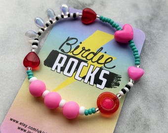 Sensory fidget bracelet. Valentines. Pink red turquoise gold. Sliding heart bead. Silicone, glass, acrylic beads.