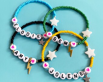 Personalised name/word beaded bracelet. Handmade. Glass seed beads with acrylic letter beads and hearts, shell star and star/lightning charm