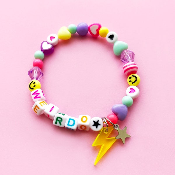 Pastel rainbow mixed bead bracelet. Can be personalised with any name or word. Lightning bolt and star charm. Smileys and hearts.