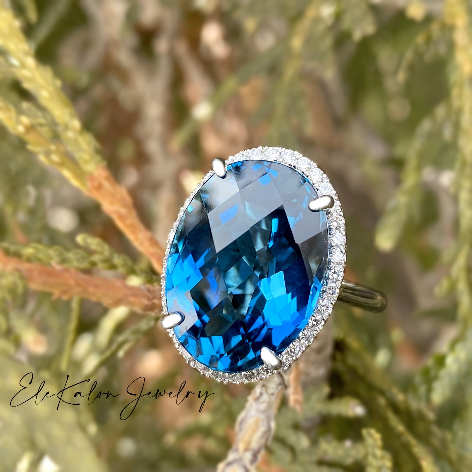 14K White Gold Blue Topaz Elegance Ring