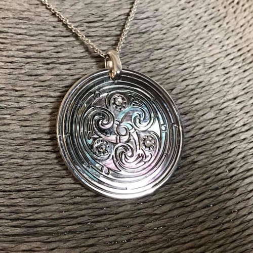 Triskele in 925 silver black mother of pearl backdrop shops Swarovski crystals. Spiritual jewel, celtic pagan gothic jewel, pendant and necklace.
