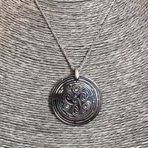 Triskele in 925 silver black mother of pearl backdrop shops Swarovski crystals. Spiritual jewel, celtic pagan gothic jewel, pendant and necklace.