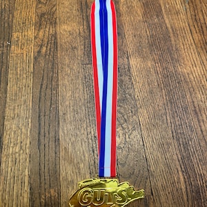 Nickelodeon global guts medal trophy