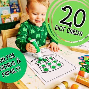 May include: A child in a green shamrock-patterned onesie uses a green marker to dot a telephone outline on a white paper. The image includes text that says "20 DOT CARDS" and "FUN FOR FRIENDS & FAMILY!"