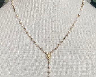 Silver 925 rosary necklace 10k gold laminated , length 21 inches , 9 grams weight .