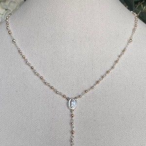 Silver 925 rosary necklace 10k gold laminated 20 inches , 8,5 grams weight .